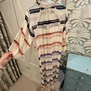 Beautiful sheer tiered cotton coverup. 👙